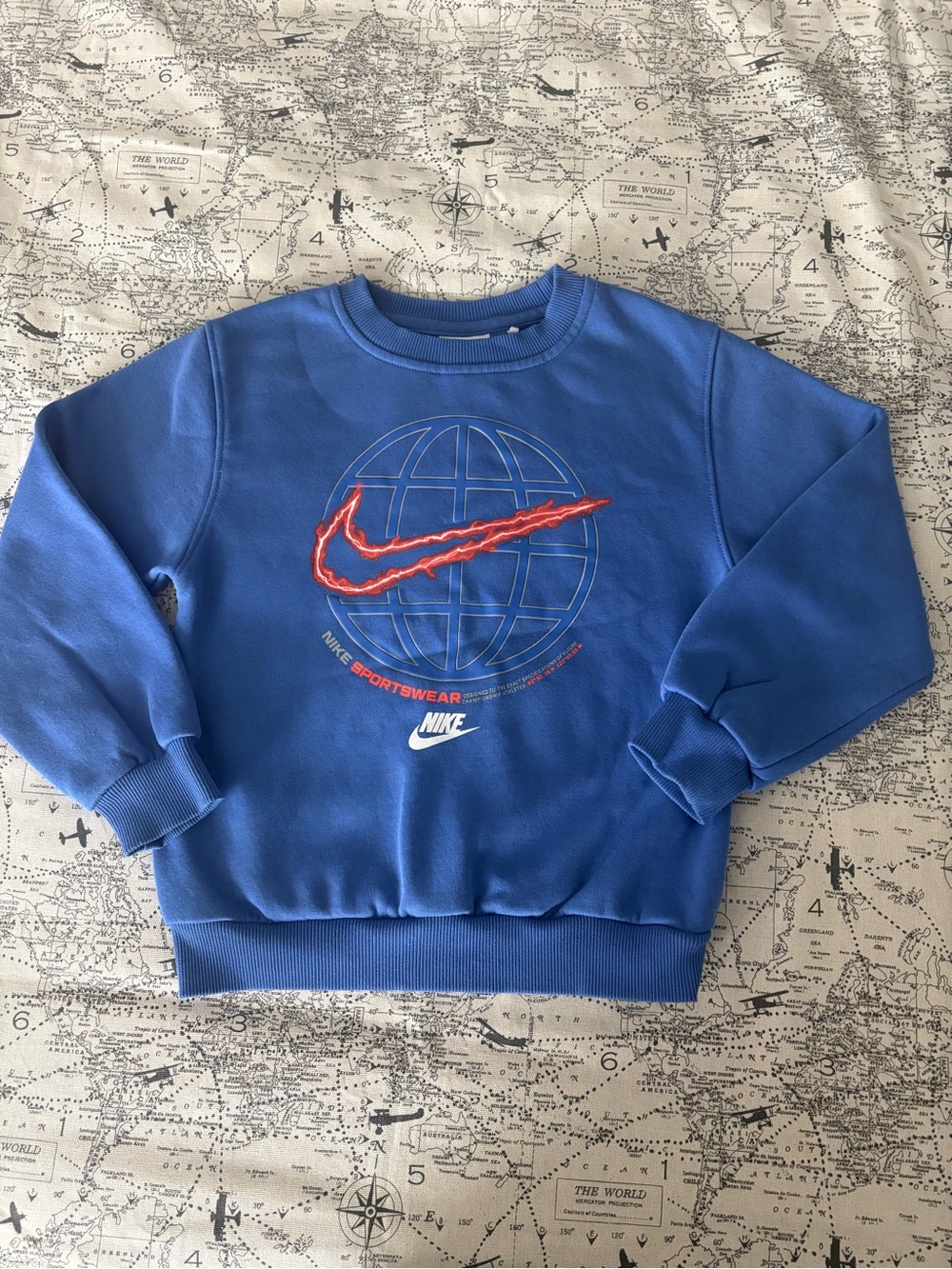 Nike Blue Crewneck Sweatshirt with Red Swoosh Globe Graphic